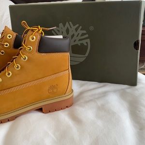 Brand New! Youth Size 6.5 Timberlands. Never been worn. Excellent condition!